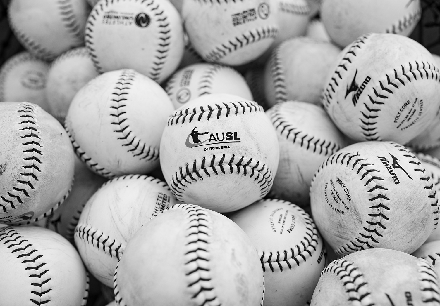 A pile of official AUSL softballs