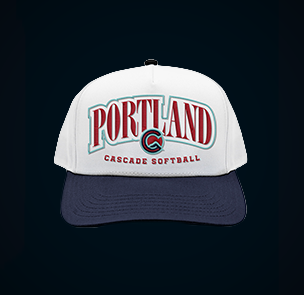 White cap with red and light blue Portland Cascade logo and navy brim